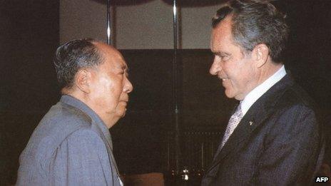 Chinese communist leader Chairman Mao Zedong (L) welcomes US President Richard Nixon to his house in the Beijing Forbidden City on 22 February 1972