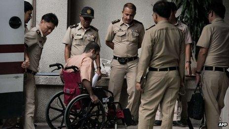 Saeid Moradi, 29, (in wheelchair), in Bangkok on 20 June 2013