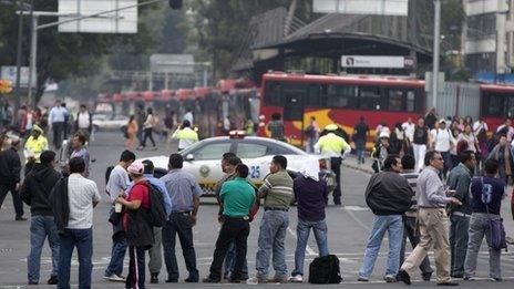 teachers block Reforma Avenue, near Senate chambers, in Mexico City, Tuesday, Aug 20