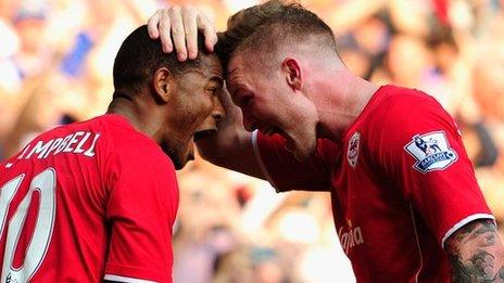 Fraizer Campbell and Aron Gunnarsson celebrate after the third Cardiff goal