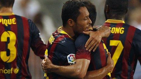 Adriano celebrates after scoring for Barcelona against Malaga