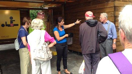 Social workers explain to Zurich residents how things work at the compound