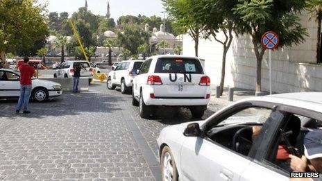 UN vehicles transport a team of weapons experts to the scene of a suspected chemical attack on 26 August 2013