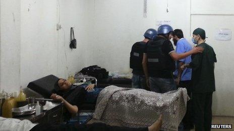 UN experts visit a hospital at the site of an alleged chemical weapons attack near Damascus, 26 August 2013