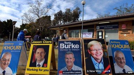 Voters arrive to cast their vote during pre-pool voting in western Sydney on 22 August 2013