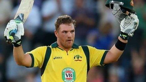 Australia's Aaron Finch celebrates bringing up his century