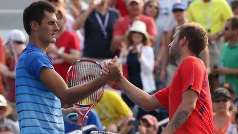 Dan Evans (right) and Bernard Tomic