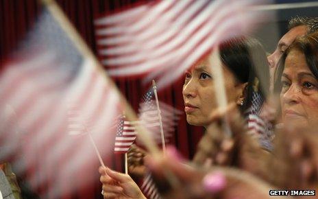 Americans wave flags