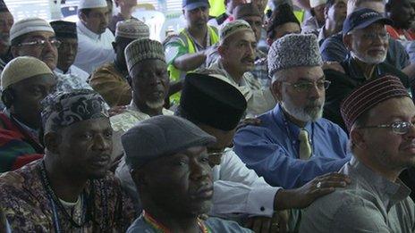 Ahmadis listen to a speech