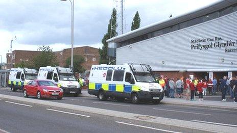 Police vans outside Racecourse stadium