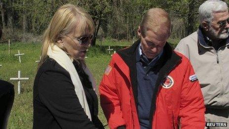 Forensic anthropologist shows a map of the graveyard to Senator Bill Nelson, during a tour of the closed Dozier School for Boys in Marianna, Florida.