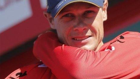 Nicolas Roche in the race leader's red jersey