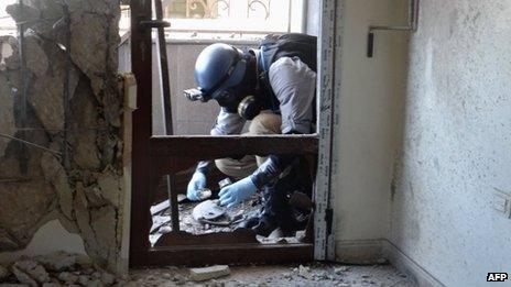 United Nations (UN) arms expert collects samples in the Ghouta region