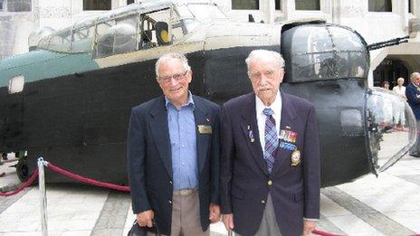 Ken with his son Keith in front of a Lancaster