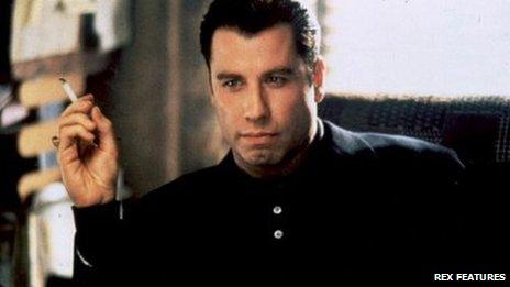 John Travolta as Chili palmer in get Shorty
