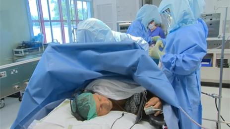 Paul Eaton undergoing surgery