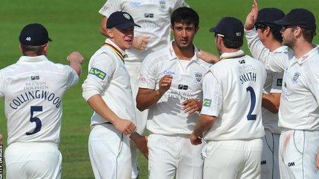 Durham players celebrate