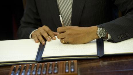 Barack Obama signing his name