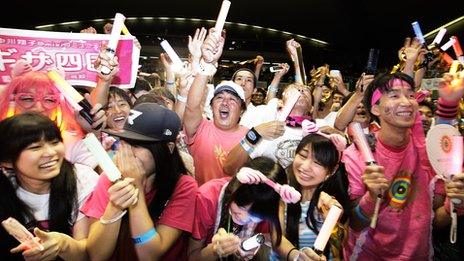 Tokyo residents celebrate at Komazawa Olympic Park