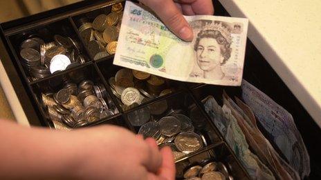 Cashier handling money