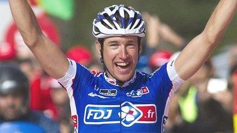 Frenchman Alexandre Geniez raises his arms aloft after winning stage 15 of the Vuelta