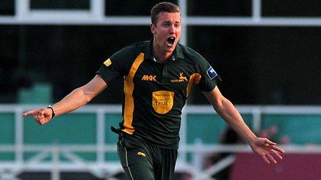 Notts bowler Jake Ball celebrates a wicket