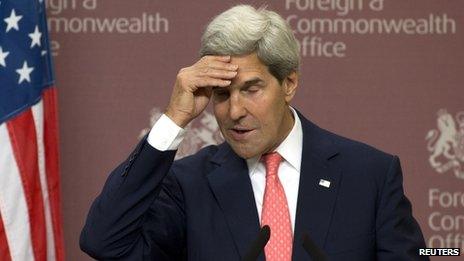 US Secretary of State John Kerry reacts during a news conference at the Foreign and Commonwealth Office in London on 9 September 2013