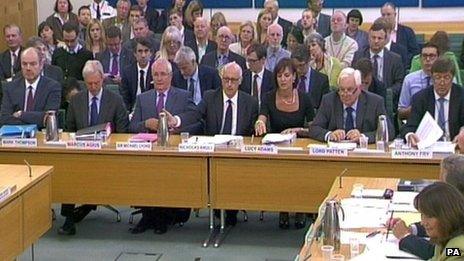 (Left to right) Former BBC director general Mark Thompson; Marcus Agius, former chairman of the BBC executive board remuneration committee; Sir Michael Lyons, former Trust chairman; Nicholas Kroll, director of BBC Trust; Lucy Adams, BBC HR director; Lord Patten, BBC Trust chairman; and Anthony Fry, BBC Trust member, sit before the Commons Public Accounts Committee in London on 9 September 2013