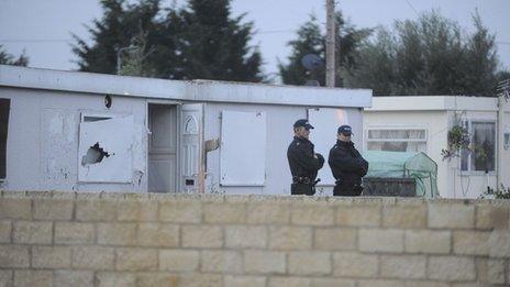 Police raiding homes at Smithy Fen in Cambridgeshire