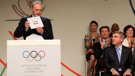 Thomas Bach (R) is announced as the ninth IOC President by President of the IOC Jacques Rogge during the 125th IOC Session - IOC Presidential Election on 10 September 2013 in Buenos Aires, Argentina.