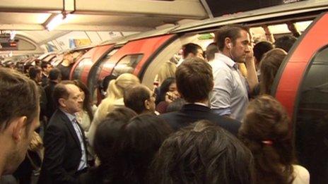 People struggling to get on a Central Line train on Tuesday morning