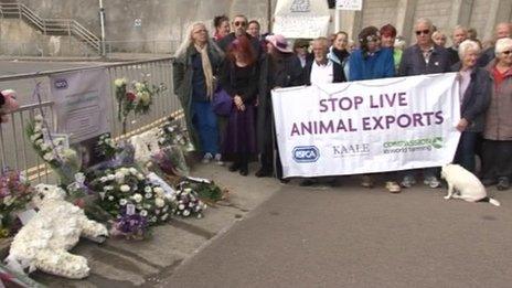 Campaigners with banner and wreath