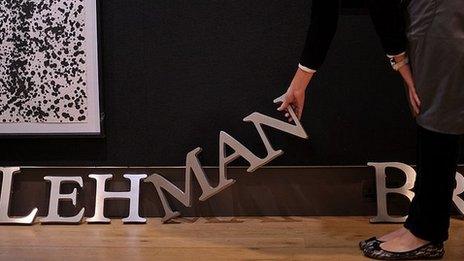 A Lehman Brothers sign is auctioned at Christies in London in 2010