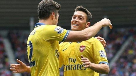 Olivier Giroud and Mesut Ozil