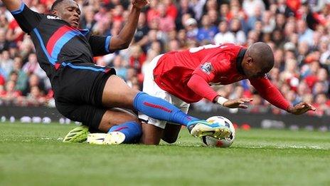 Manchester United's Ashley Young (right) is tackled by Kagisho Dikgacoi in the incident which saw the Crystal Palace man sent off