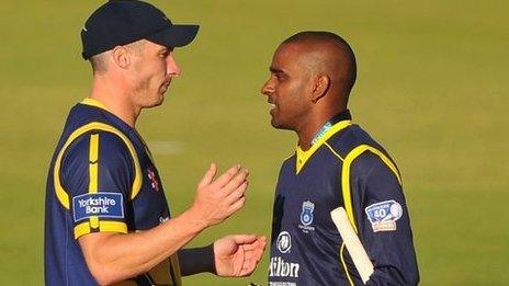 Simon Jones of Glamorgan commiserates with Dimitri Mascarenhas of Hampshire