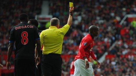 Ashley Young booked