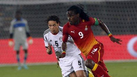 Egypt's Ibrahim Salah (left) fights for the ball against Ghana's Derek Boateng