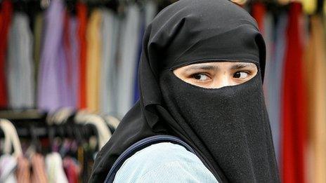 Young woman in London wearing a niqab