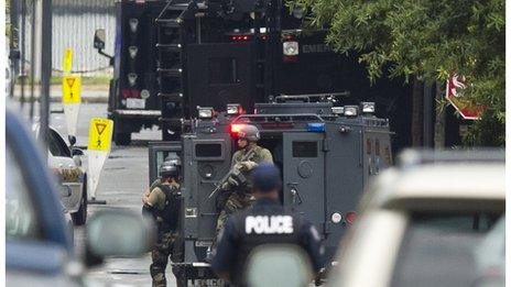 Police and military vehicles at the navy yard