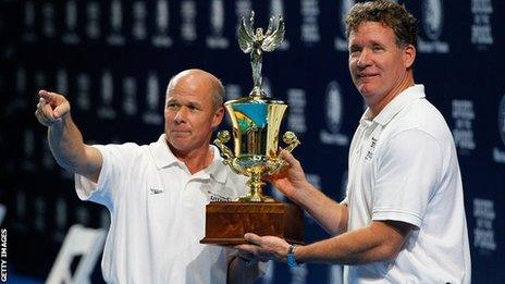 Jack Bauerle and David Marsh of the United States lift the trophy in Atlanta