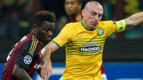 Sulley Muntari and Scott Brown