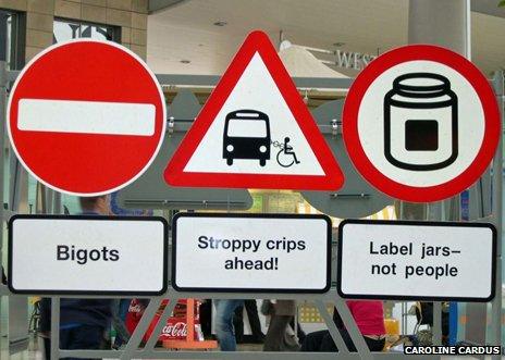 Signs reading "bigot", "stroppy crips", "label jars"