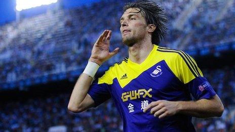 Michu celebrates his goal