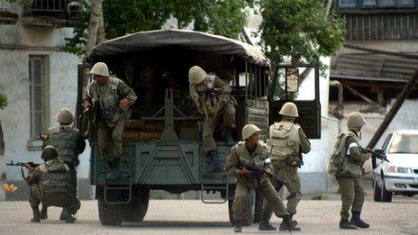 Uzbek soldiers in Andijan where troops were accused of killing hundreds of protesters in 2005