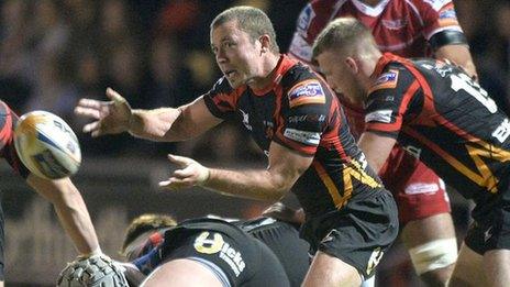 Richie Rees passes the ball from the base of a maul against Scarlets