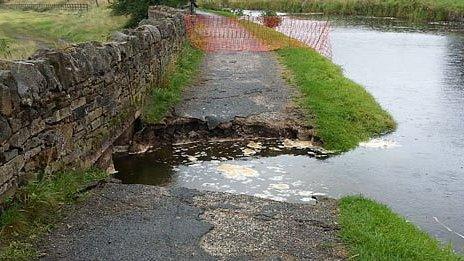 The damaged Leeds and Liverpool Canal towpath