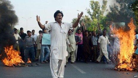 Pakistani Christians gather in a protest in Islamabad on September 22, 2013, against the killing of their community members in two suicide bomb attacks on a Church in Peshawar. A