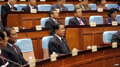 Cambodian Prime Minister Hun Sen (front C) sits during the National Assembly meeting in Phnom Penh on 24 September 2013