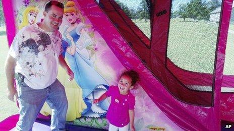 Veronica, right, with her biological father, Dusten Brown, at a birthday party for her in Tahlequah, Oklahoma